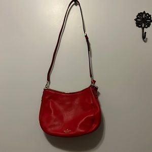 Kate spade handbag 15 inches wide by 9 inches long.